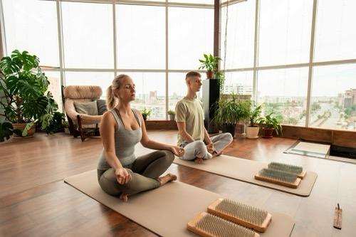couple-pose-and-meditating