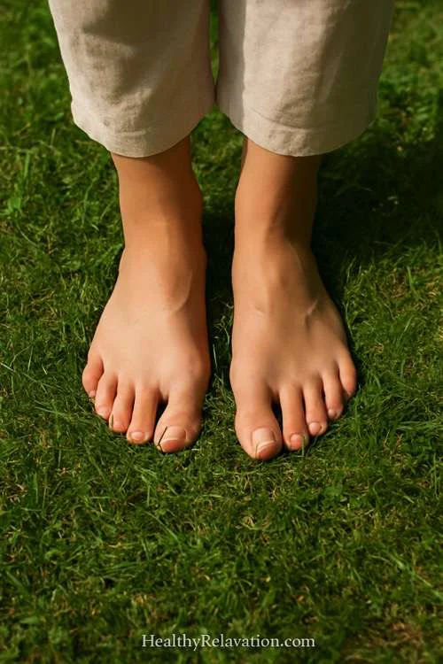 Grounding on grass healthy relaxation