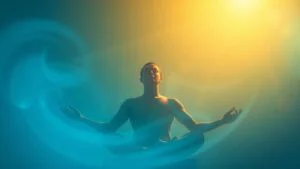 Person meditating in peaceful, calming light.